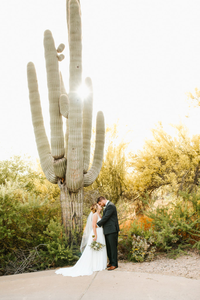 Arizona bride and groom with saguaro